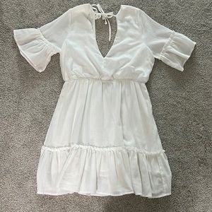 White, short sleeve summer dress size large from Lulu’s. Worn once.